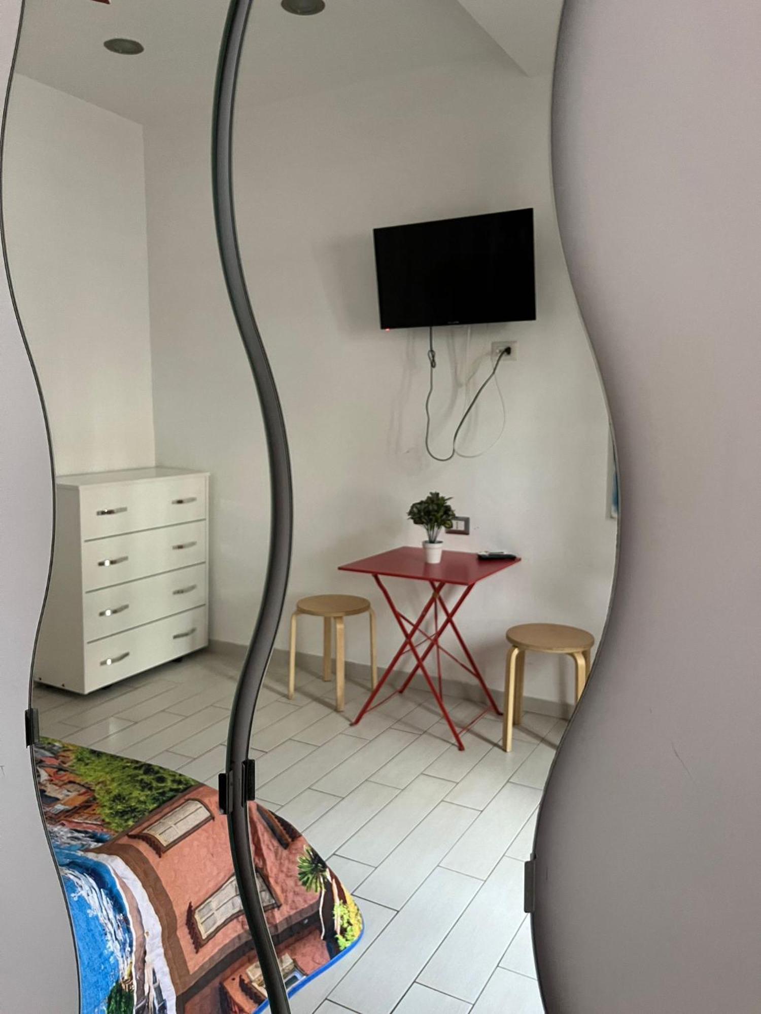Family Room ปอร์ติชี ภายนอก รูปภาพ