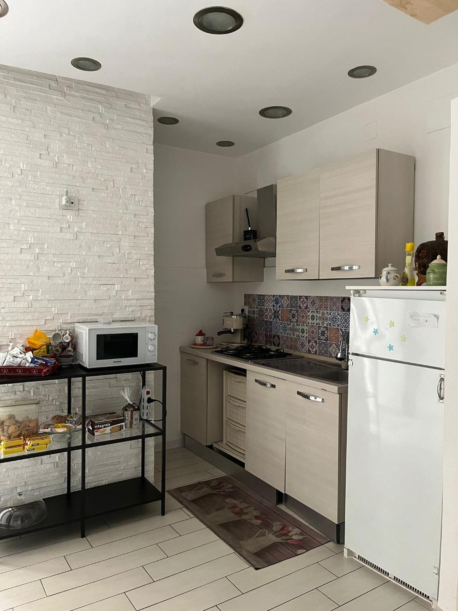 Family Room ปอร์ติชี ภายนอก รูปภาพ